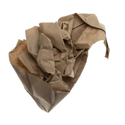 A Piece Of Package Paper Crumpled Isolated On White Background A Piece Of Package Paper Crumpled Isolated On White Background