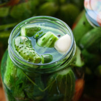 Pickled Cucumbers With Garlic And Spices In Brine In An Open Gla Pickled Cucumbers With Garlic And Spices In Brine In An Open Gla