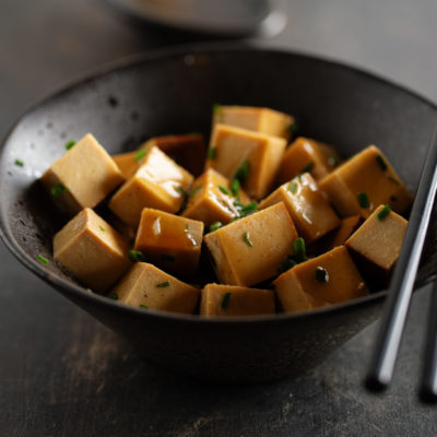 Chunks Of Tofu With Sauce In Bowl Chunks Of Tofu With Sauce In Bowl